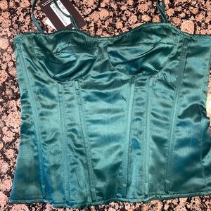 Emerald green corset top from PRETTYLITTLETHING